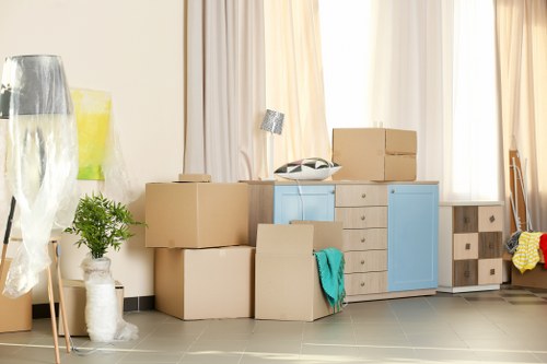Stacked storage boxes and pricing paperwork in a clear storage setting