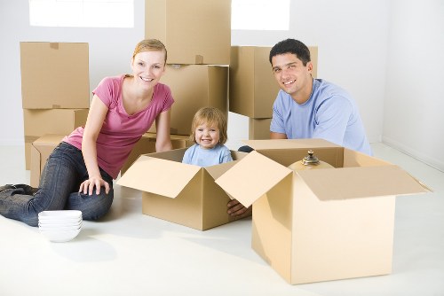 Person organizing boxes in a Chalkfarm storage space