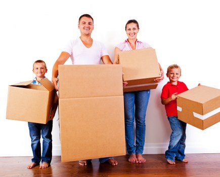 Moving van and packed boxes for removals in Chalkfarm