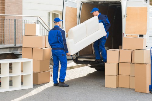 Office relocation planning in Chalkfarm with moving boxes and workspace items