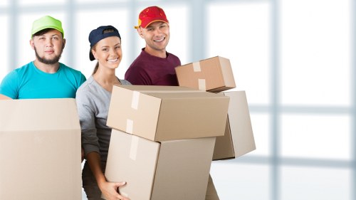 Professional mover handling a compact flat relocation in Chalkfarm