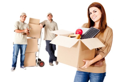 Measured cubic-yard load shown alongside furniture and boxes